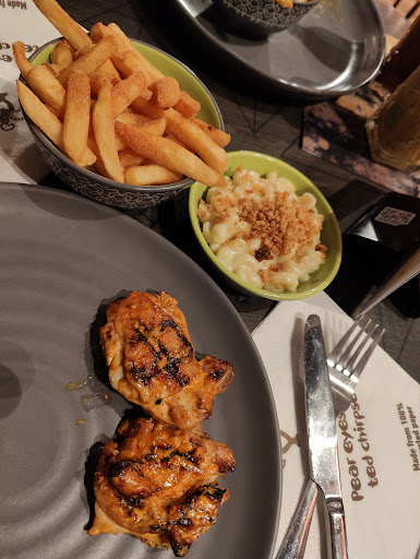 Photo of Nando's Cheltenham - Unit 2, The Brewery Quarter, St Margaret's Rd, Cheltenham GL50 4EQ